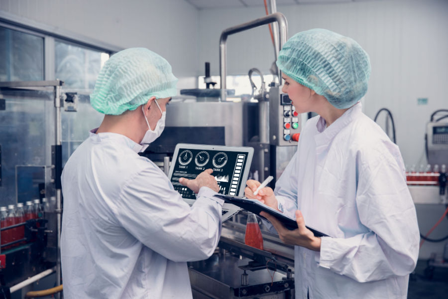 quality control team working with inspection machine