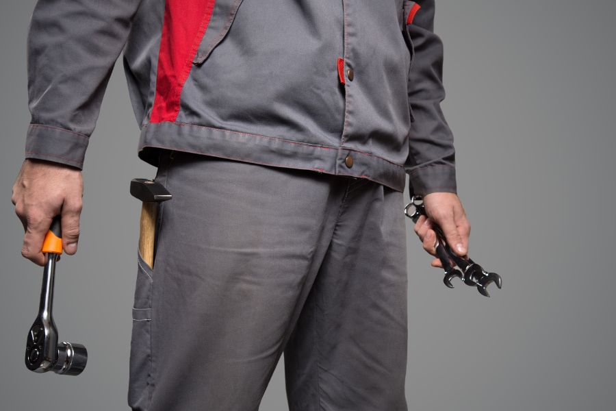 x ray mechanic holding different kind of tools