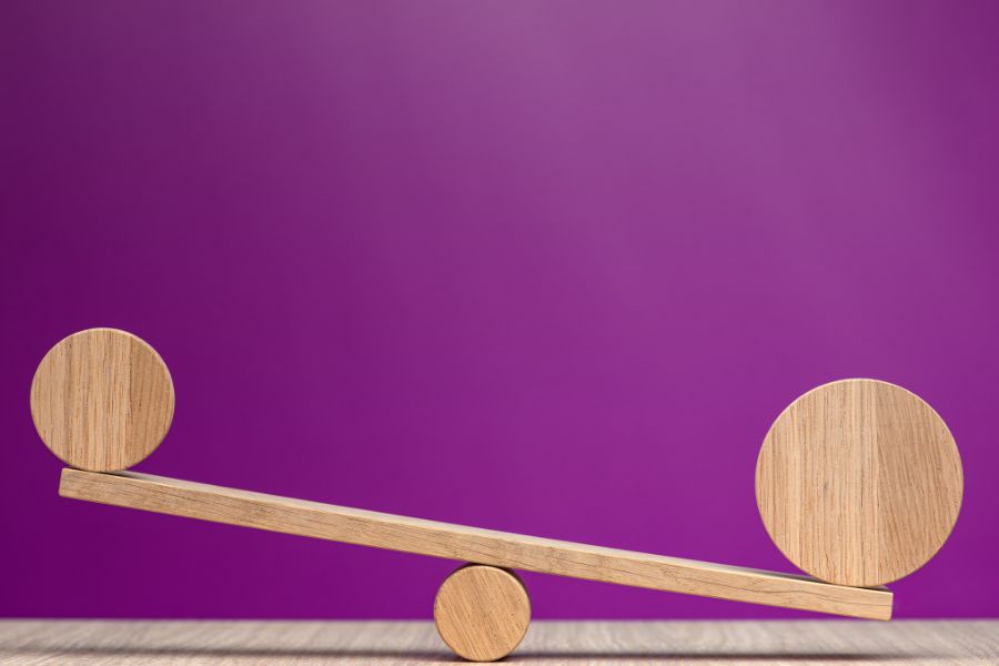 wooden scales with circles of different sizes