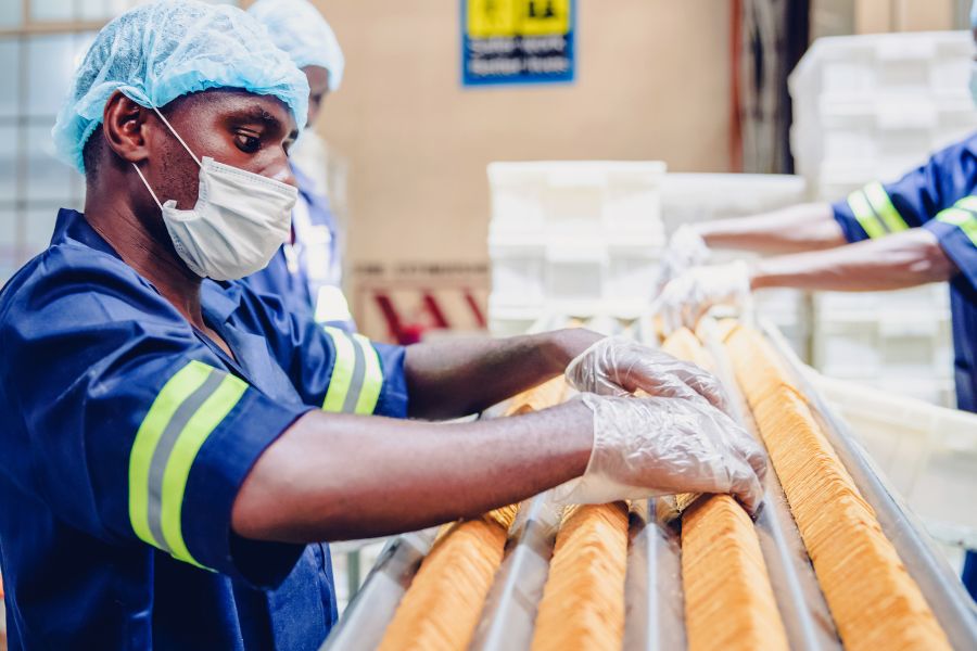 man working on a biscuit production facility