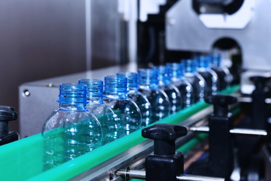 clear plastic bottles on automated conveyor systems