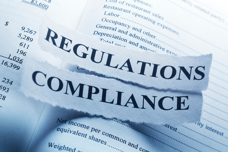 regulation compliance written in paper