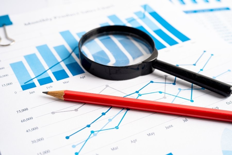 magnifying glass pencil and inspection data