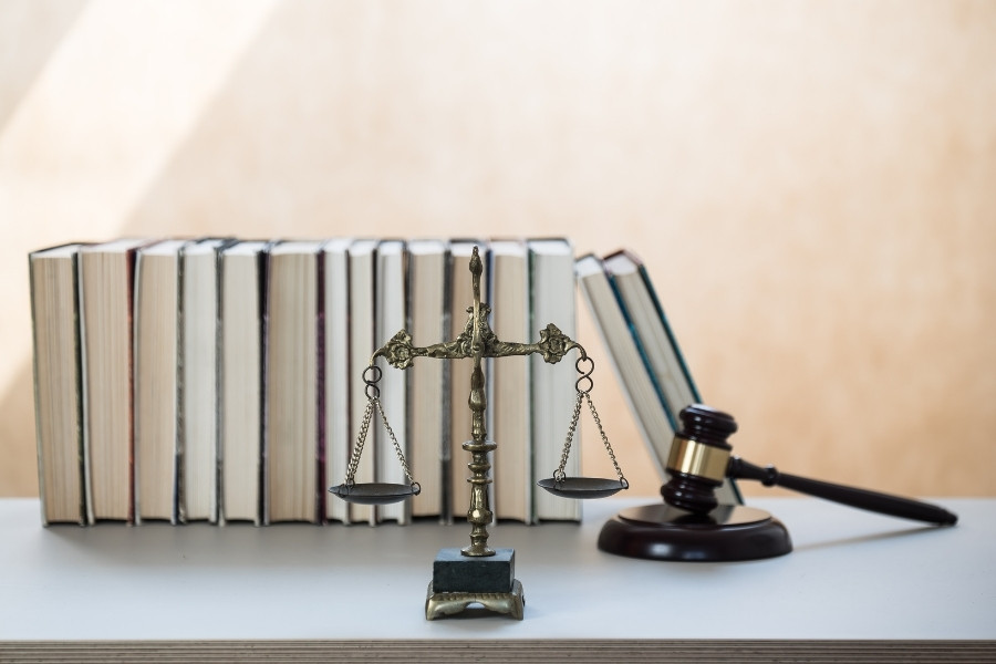 gavel law books and justice scale