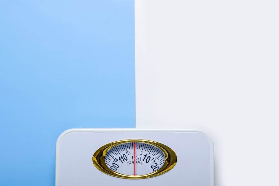 weighing scale in white and blue background